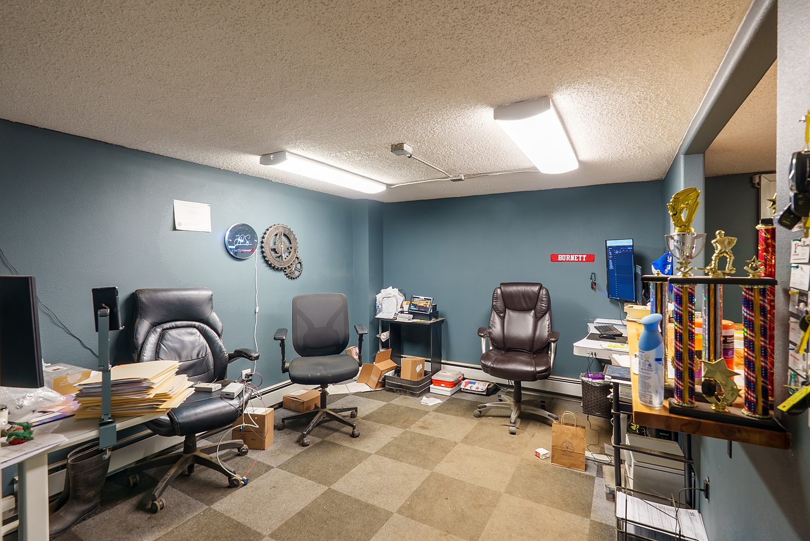 Finished office suite with desks at 399 Helmericks Avenue