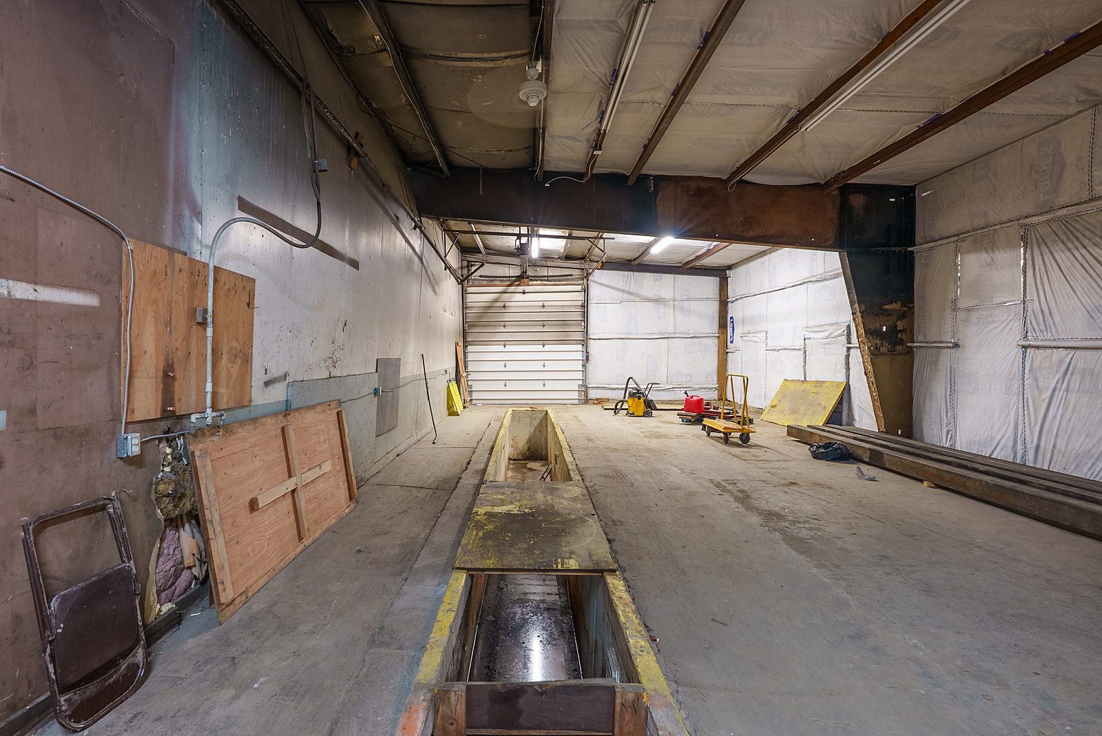 Service and wash pit at 399 Helmericks Avenue